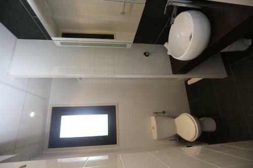 Apartamento O'sullivans Bar And Hotel