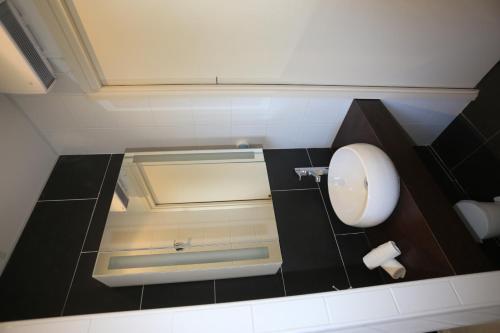 Apartamento O'sullivans Bar And Hotel