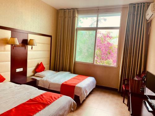 Xishuangbanna Jinjiangnan Business Hotel