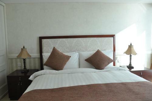 Qingdao Jinshan We+ Holiday Apartment ?wusi Square?