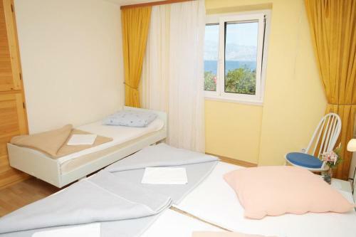 Apartment Postira 5660a