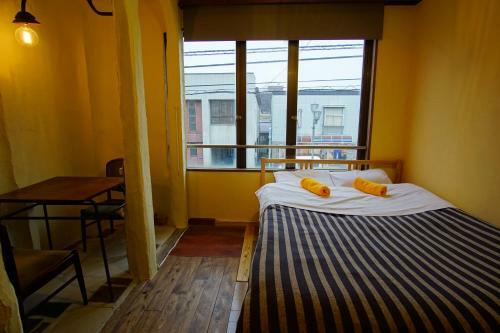 Hostal Hakuba Station Guesthouse En