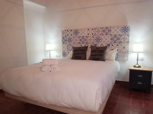 Reservaloen Casa Sevillana