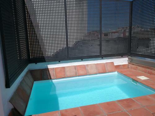 Reservaloen Casa Sevillana