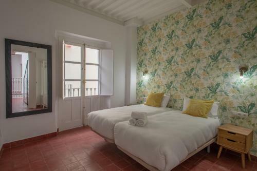 Reservaloen Casa Sevillana