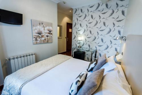 Hostal Cuatro Caminos Rooms