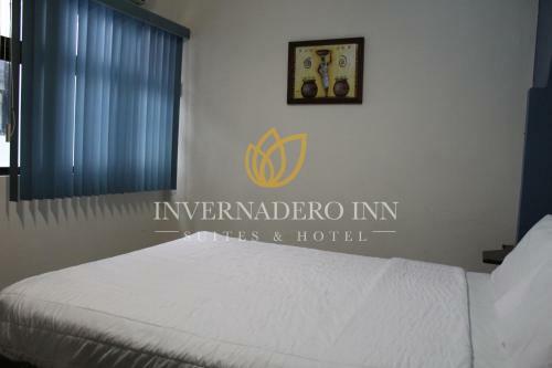 Suites Invernadero Hotel