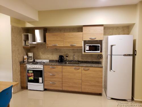 Apartamento Malvinas Departamentos