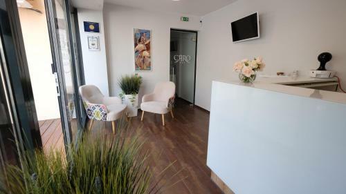 Hotel Caro Apartments & Rooms