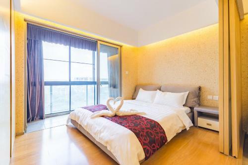 Chengdu Happy Trip Holiday Apartment