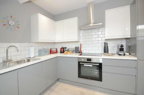 Apartamento Froghall Suites