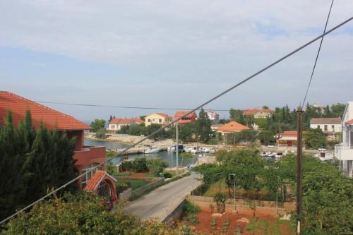 Apartments By The Sea Ugljan - 8301