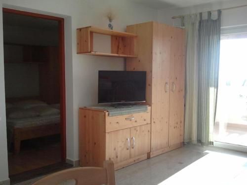 Apartments With A Parking Space Banjol (rab) - 14134
