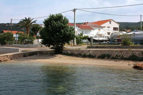 Apartments With A Parking Space Barbat (rab) - 14431