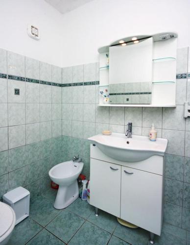 Apartments With A Parking Space Barbat (rab) - 4988