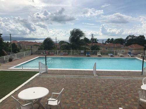 Apartamento Mango Walk Country Club Suites