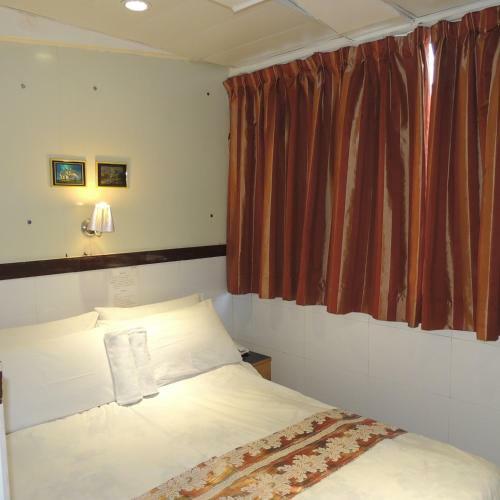Hostal Hotel Guan Zhou