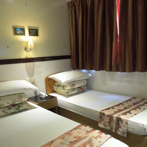 Hostal Hotel Guan Zhou