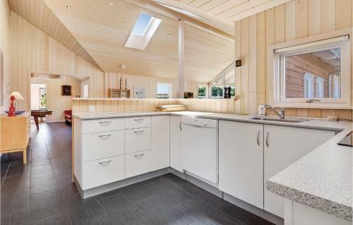 Four-bedroom Holiday Home In Lokken