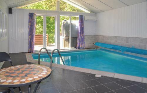 Three-bedroom Holiday Home In Norre Nebel
