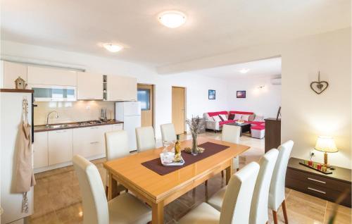 Three-bedroom Apartment In Komarna
