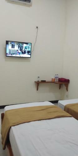 Hostal Arrys Watukarung Surfcamp