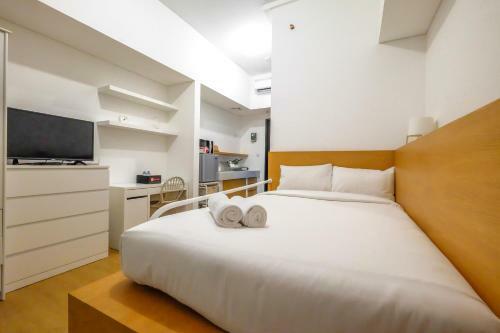 Modern Minimalist Studio Casa De Parco Apartment By Travelio