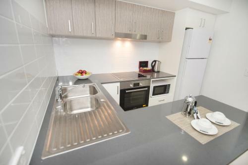 Aparthotel Gladstone Central Plaza