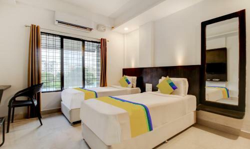 Treebo Trip Hotel Coral