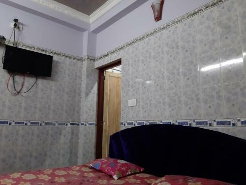 Hotel Goroomgo Sureswory Pampa Puri