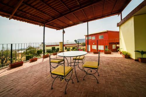 Capital O Hotel Villa Esperanza