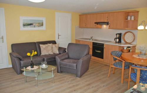 Apartamento Ferienappartements Unterm Reetdach