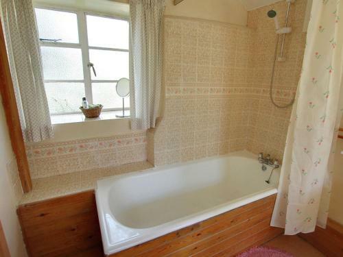Rustic Cottage In Slaughterford With Fireplace