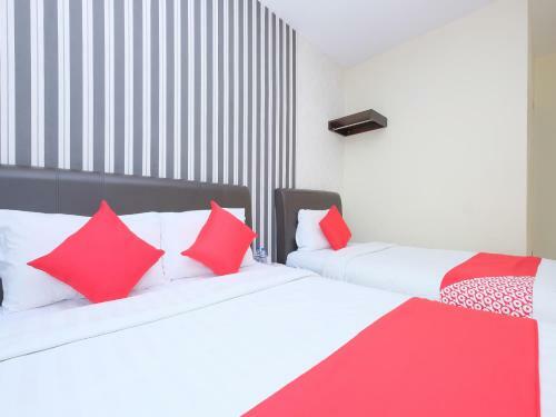 Hostal Oyo 89493 Q Hotel