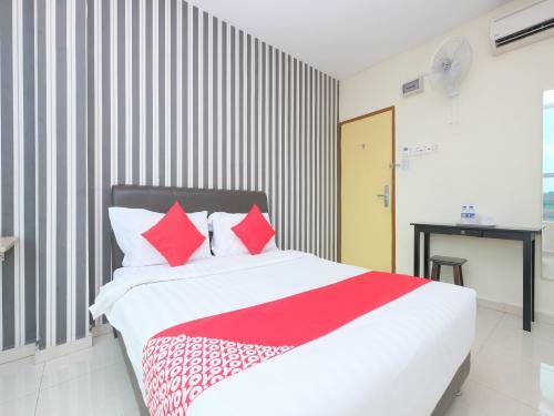 Hostal Oyo 89493 Q Hotel