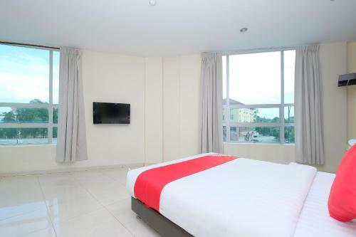 Hostal Oyo 89493 Q Hotel