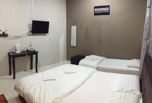 Hostal Anggun Beach Guest House