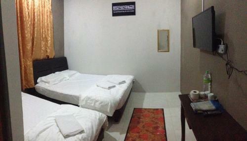 Hostal Anggun Beach Guest House