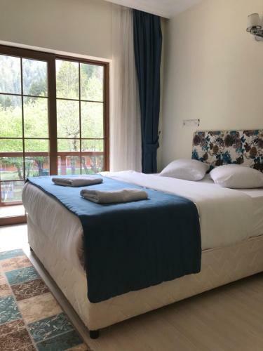Apartamento Mego Suite Otel