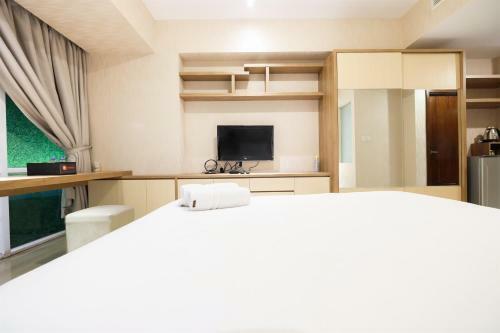 Dazzle Studio Room @ U-residence Apartment By Travelio