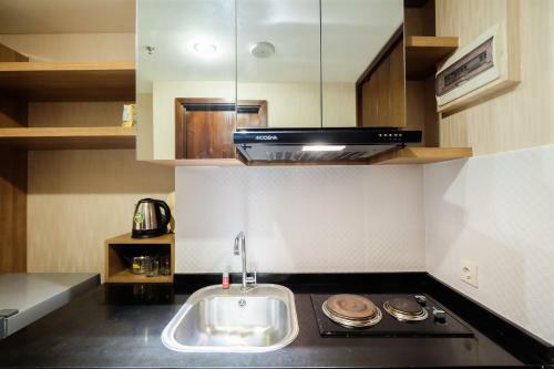Dazzle Studio Room @ U-residence Apartment By Travelio