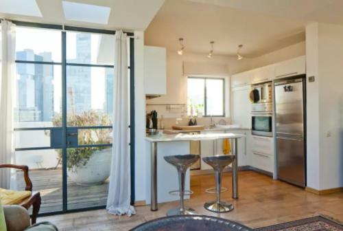 Apartamento The Rothschild Elegant Rooftop