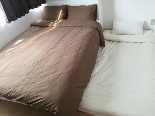 Apartamento Issyuku Hostel