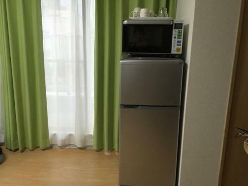 Apartamento Issyuku Hostel