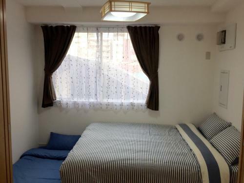 Apartamento Issyuku Hostel