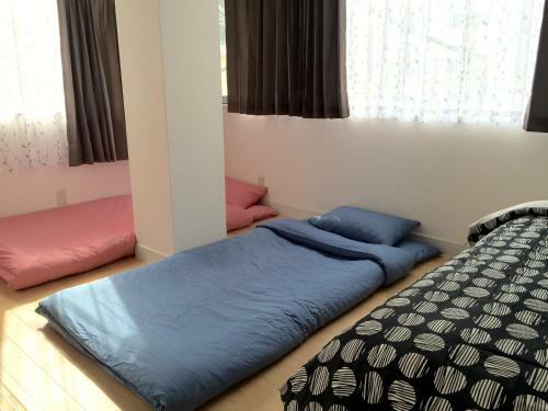 Apartamento Issyuku Hostel