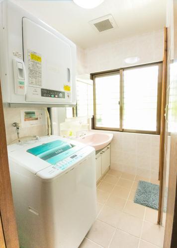 Hostal Okinawa New Hope Yomitan