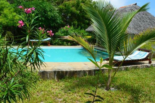 Coast Sun Gardens Cottage
