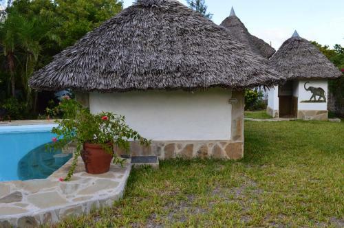 Coast Sun Gardens Cottage