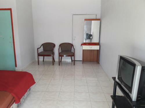 Hostal Rumah Rehat Qnm Holidays